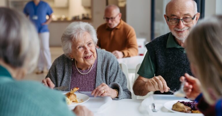 Seniors at lunch in a community center