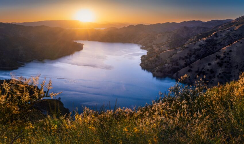 Late-day sun over Lake Berryessa and dry hills in the Napa County mountains