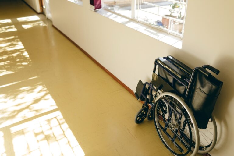 Empty wheelchair in a care home hallway